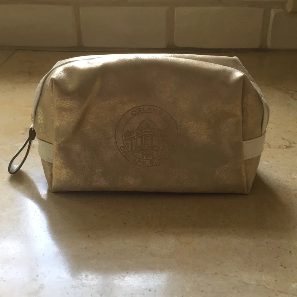 Gold distressed Orlane Paris makeup/cosmetic bag